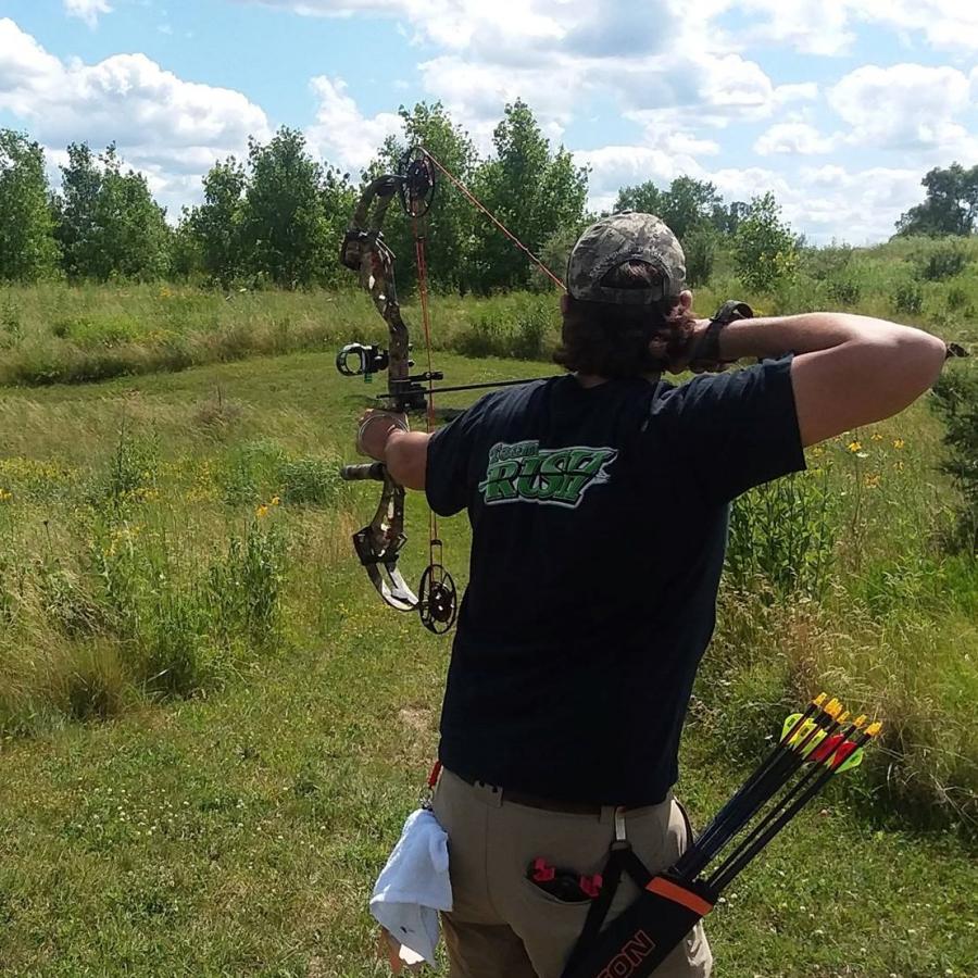 Archer at the outdoor target range at Demmer Center.