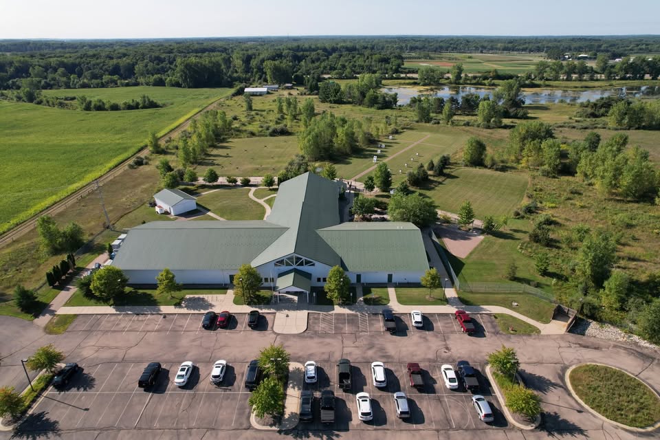 An overview shot of MSU’s Demmer Center showing the building, archery ranges and parking lot.