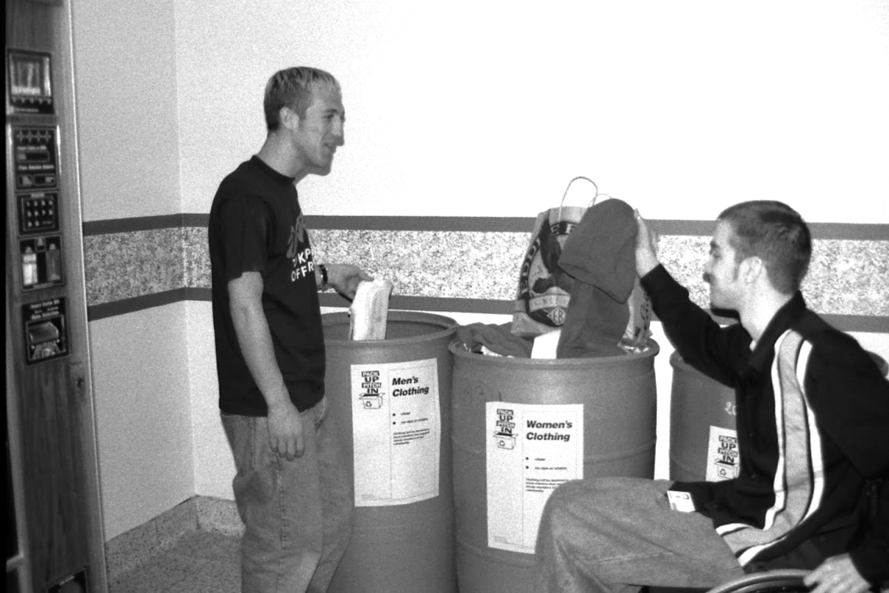 Two students donate belongings during Pack Up. Pitch In. years past.