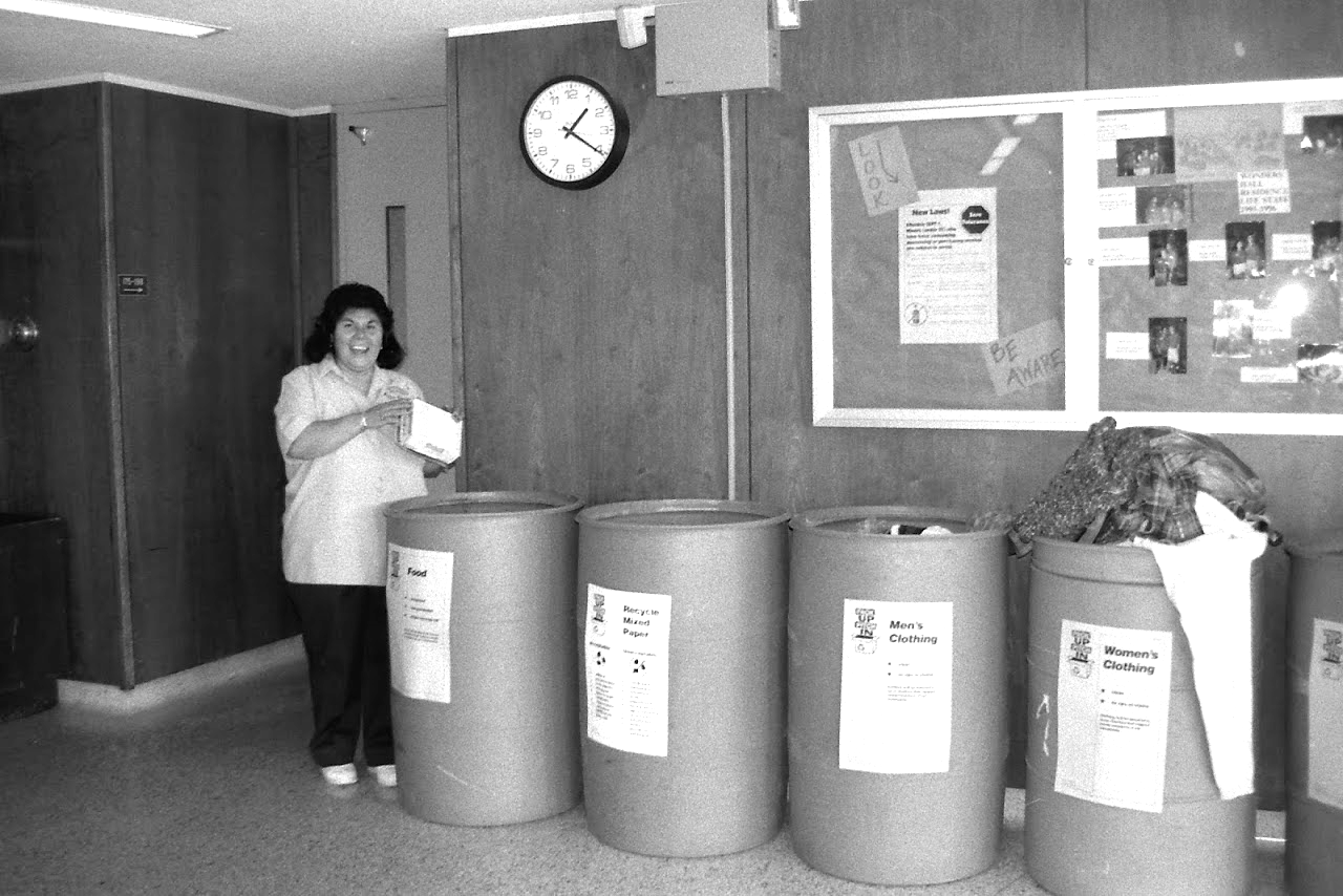 A team member drops off food to one of the Pack Up. Pitch In. bins during an earlier incarnation of the program.