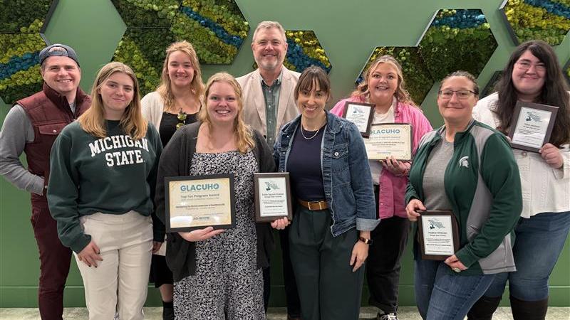 The RHS team stands proudly with its awards at GLACUHO 2025.