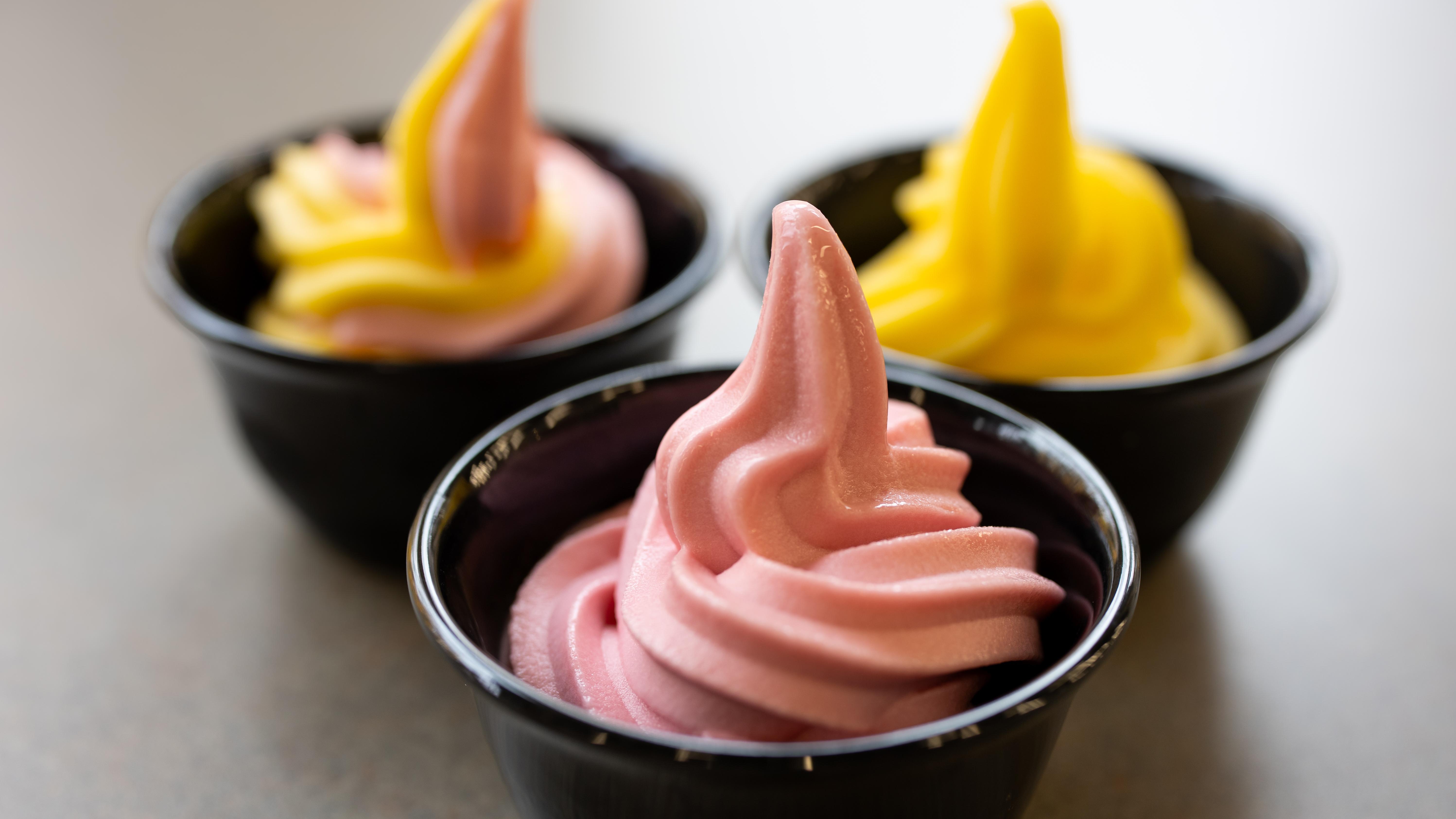 Three small bowls with various Dole Whip flavors