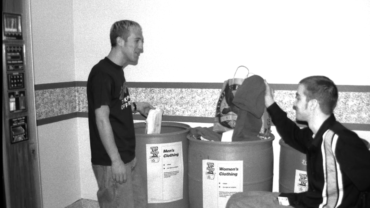Two students donate belongings during Pack Up. Pitch In. years past.