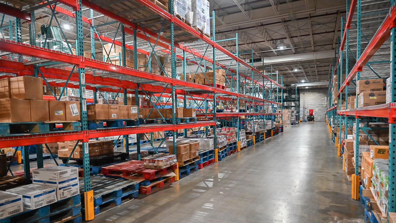 The Food Stores warehouse shelves filled with inventory for use in MSU’s dining spaces.